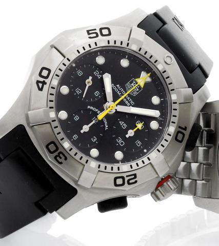 To be Sold Without Reserve.Aquagraph.Tag Heuer, 2000 Aquagraph, Professional, Automatic, Chronograph, Ref. CN211A. Made circa 2000..Fine, self-winding, water-resistant to 500 m., stainless steel driver's wristwatch with helium escape valve.square button c