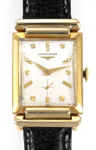 Hooded Lugs.Longines, No. 9907335, case No. 315783, Ref. 180. Made in the 1950s..Fine, rectangular, 14K yellow gold gentleman`s wristwatch. Sold for the American market.