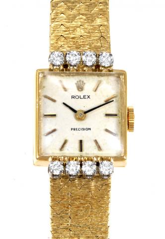 Ref. 2616-1 Yellow Gold Diamonds.Rolex, Precision, Ref. 2616-1. Made in the 1960s..Fine and rare, square18K yellow gold lady`s wristwatch with eight diamonds on the bezel and an integrated 18K yellow gold linen-textured bracelet.