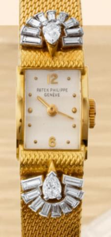 Patek Philippe, Geneve, No. 843717, case No. 686813, Ref. 1189. Madein the 1950s..Very fine and rare, rectangular, 18K yellow gold and diamonds lady's wristwatch with an integrated and.linen-textured 18K yellow gold bracelet.