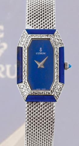 Corum, Ref. 17127B47. Made in the 1970s..Very fine and unusual, octagonal, 18K white gold, lapis lazuli and diamond lady's wristwatch with an.integrated, 18K white gold Corum mesh bracelet.