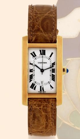 Tank Am_ricaine.Cartier, Paris, Tank Am_ricaine, Automatic, Ref. 02860. Made in the 1990s..Very fine, rectangular, center-seconds, self-winding, water-resistant, 18K yellow gold gentleman's wristwatch.with date and an 18K yellow gold Cartier buckle. Accom