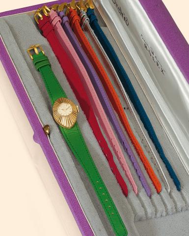 Ref. 2000J.Cam_l_on.Rolex, Precision.Cam_l_on, Ref. 2000J. Made in.the 1960s..Fine and unusual, oval, 18K yellow.gold lady's wristwatch with assorted.blue, pink, green, mauve, orange, red.and silver leather straps with their 18K.yellow gold-plated Rolex b