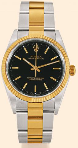 Ref. 14233 Oyster Perpetual.Rolex, Oyster Perpetual, Superlative Chronometer.Officially Certified, Ref. 14233..Made circa 2000..Fine, tonneau shaped, center seconds, self-winding, waterresistant.stainless steel and gold gentleman