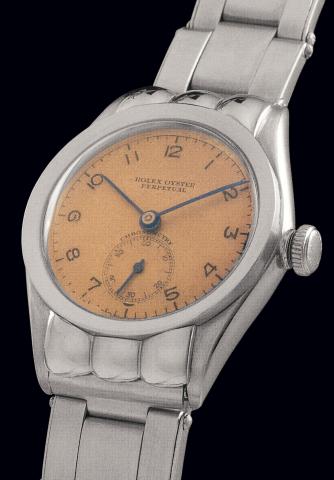 Ref. 3353, so-called Rigid Hooded.Rolex, Oyster Perpetual, Chronometer, Ref. 3353. Case No. 146243. Made.in 1940..Very fine and very rare, tonneau-shaped, self-winding, water-resistant, stainless steel.mid-sized wristwatch with hooded lugs and a stainless