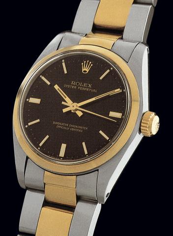 Ref. 6748.Rolex, Oyster Perpetual, Superlative Chronometer, Officially Certified.Ref. 6748/6751. Case No. 6700779. Made in 1982..Fine, tonneau-shaped, center seconds, self-winding, stainless steel and yellow gold.mid-size wristwatch with stainless steel a