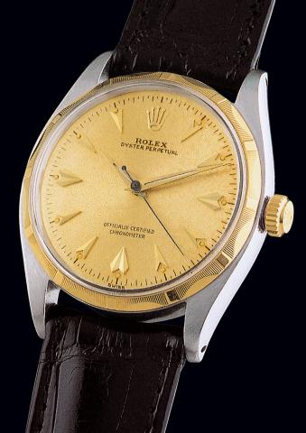 Ref. 6566.Rolex Oyster Perpetual, Officially Certified Chronometer.Ref. 6566. Case No 311356. Made in 1957..Fine, center-seconds, self-winding, water-resistant, stainless steel and yellow gold.gentleman's wristwatch with a gold plated Rolex buckle.