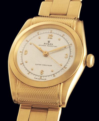 Ref. 5087 Super Precision.Rolex, Oyster Perpetual, Super Precision, Ref. 5087, Rigid.Hooded. Case No. 699128. Made in 1950..Very fine and rare, tonneau-shaped, water-resistant, center seconds, self-winding.14K yellow gold gentleman's wristwatch chronomete