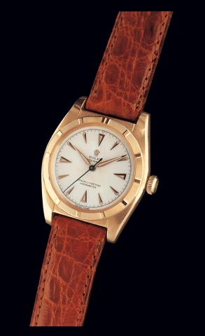 Ref. 5011, Pink Gold So-Called Ovetto Bubble-Back.Rolex Oyster Perpetual, Officially Certified Chronometer.Ref. 5011. Case No. 658392. Made in 1949..Fine and rare, center seconds, water-resistant, 18K pink gold gentleman's wristwatch.with a gold plated Ro