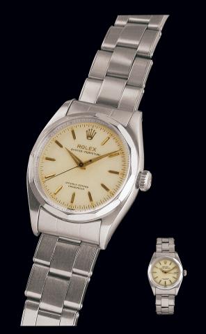 Ref. 6586.Fantasie.Rolex, Oyster-.Perpetual, Officially Certified Chronometer.Ref. 6586. Case No. 172144.Made in 1956..Very fine and rare, tonneau shaped.center seconds, self-winding, waterresistant.stainless steel and white gold.gentleman's wristwatch wi