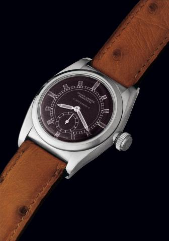 Ref. 1858 Rolesium Didactic Black Dial.Rolex, Oyster Perpetual, Didactic Ref. 1858. Case No 014224..Made in 1933 and retailed by C. Bucherer..Extremely fine, rare and early, tonneau-shaped, self-winding, water-resistant.Rol_sium gentleman's wristwatch wit