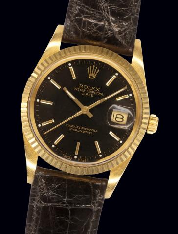Ref. 15038 Yellow Gold Date Black Dial.Rolex, Oyster Perpetual, Date, Superlative.Chronometer Officially Certified, Ref..15038/15000. Case No. 9606086. Made in 1986..Fine, 18K yellow gold, tonneau-shaped, center seconds, selfwinding.water-resistant, gentl