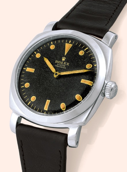 Rolex, Oyster Precision, Ref. 6154. Made in.the 1950s..Fine and very rare, large, cushion-shaped.water-resistant, stainless steel military diving wristwatch.with a stainless steel Rolex buckle. Accompanied by recent.service papers.