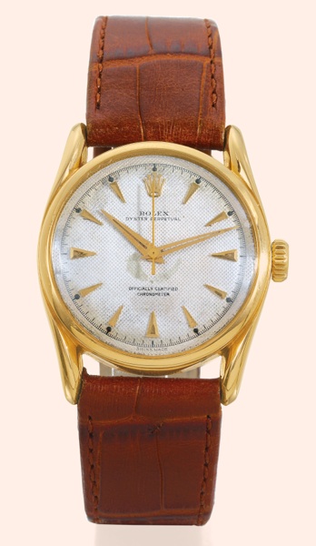 Ref. 6102, So-Called Bomb_e.Rolex, Oyster Perpetual, Officially Certified.Chronometer, Ref. 6102. Made circa.1952..Fine and rare, center seconds, self-winding, water-resistant.18K yellow gold gentleman