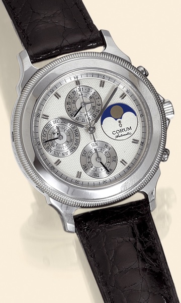 Automatic Perpetual No. 2.Corum Automatic Perpetual, No. 02/100, case No. 502086, Ref. 83.109.70. Made in 1991 in a limited edition.of 100 pieces..Very fine, astronomic, self-winding, water-resistant, platinum gentleman's wristwatch with round button.chro