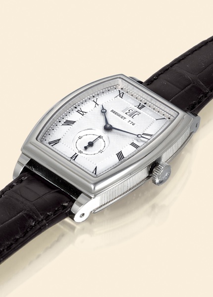 White Gold Heritage.Breguet, Heritage, No. 776, Ref. 5480..Made circa 2000..Very fine, tonneau-shaped and curved, self-winding, waterresistant.18K white gold gentleman's wristwatch with large.date and an 18K white gold Breguet deployant clasp..Accompanied