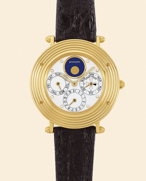 G_rald Genta, Ref. G 3312.4. Made.in the 1980s..Very fine and elegant, thin, astronomic.water-resistant, 18K yellow gold gentleman's.wristwatch with perpetual calendar, moon phases and.an 18K yellow gold G_rald Genta buckle. Accompanied.by a fitted box an