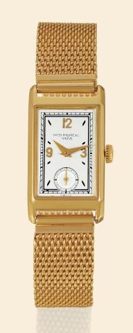 Yellow Gold Art.Deco Ref. 407.Patek Philippe Co..Geneve, No. 830626, case No. 503509..Ref. 407. Made in 1936..Very fine and rare, 18K yellow gold.rectangular mid-size Art Deco wristwatch.with a 14K yellow gold mesh.bracelet. Accompanied by an Extract.fr