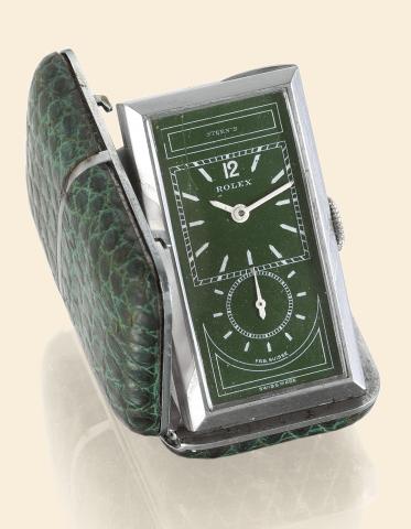 Rolesium Sporting Princess, Green Dial.Rolex, retailed by Stern, No. 75908, case.No. 1925, Ref. 1564. Made in the 1930s..Fine and very unusual, Art Deco Rolesium and reptile-skin.purse watch with observatory quality movement.