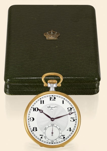 King Farouk.Breguet, No. 1880/24071. Presentation watch.specially made for King Farouk, circa 1935..Fine and rare, silver and yellow gold, keyless dress watch.with the original presentation box with applied gilt crown.