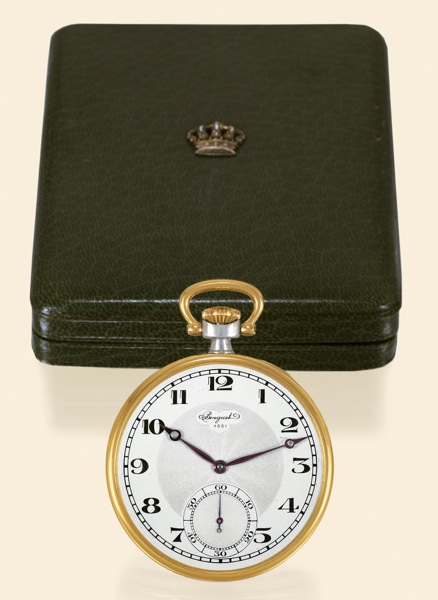 King Farouk.Breguet, No. 1881/24072. Presentation watch.specially made for King Farouk, circa 1935..Fine and rare, silver and yellow gold, keyless dress watch.with the original presentation box with applied gilt crown.