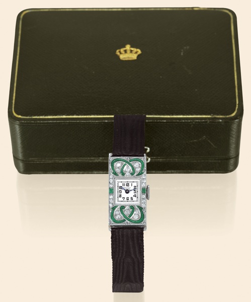 King Farouk.Breguet, No. 903..Presentation watch.specially made for King Farouk, circa.1935..Fine, platinum, green enamel, diamond.and emerald-set lady