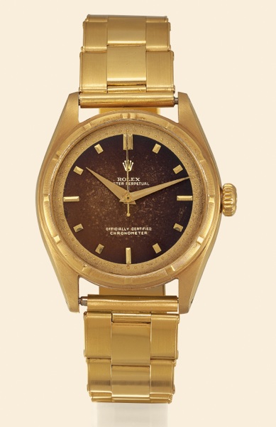 Ref. 6101 Yellow Gold _ Walnut Brown.Enamel Dial.Rolex, Oyster Perpetual, Officially Certified.Chronometer, Ref. 6101. Made in 1952..Very fine and very rare, tonneau-shaped, center-seconds.self-winding, water resistant, 18K yellow gold gentleman's.wristwa