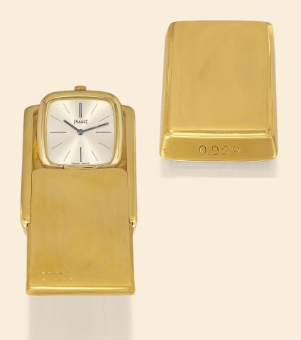 The Gold Bar.Piaget, Swiss, No. 247470, Ref. 9088. Made circa.1980..Very fine and novel, heavy, desk, purse and pocket watch.concealed in a bar of 0.999 pure gold..To be sold without reserve