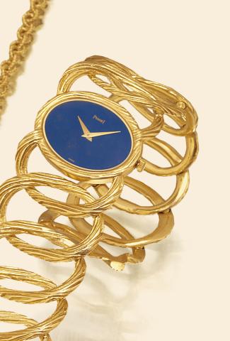 Yellow Gold Lapis Lazuli Bracelet Watch.Piaget, No. 197530, Ref. 9852D65. Made circa 1980..Very fine and elegant, 18K yellow gold lady