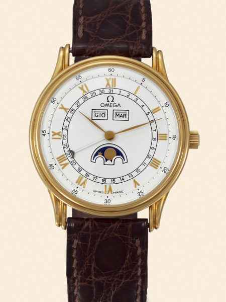 Omega, No. 37037492, Ref. BA 156.0003..Made in 1984..Fine, astronomic, water-resistant, selfwinding.18K gold gentleman`s wristwatch with triple calendar.and moon phases. Accompanied by an Omega box.