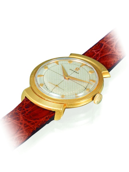 HONEYCOMB DIAL.Omega, No. 13073965, case No. 11189505, Ref. OT 14339. Made for the Hispanic market.sold on April 14, 1954..Fine and rare, self-winding, anti-magnetic, 18K yellow gold gentleman`s wristwatch with.a cream honeycomb dial and an Omega buckle. 