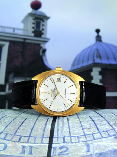 TWO-TONE C-CASE Omega, Constellation, Chronometer, Officially Certified, No. 26378046, Ref. CD.168.017. Sold on 28th November, 1968..Fine and rare, tonneau-shaped, self-winding, center-seconds, water-resistant, gold.capped gentleman's wristwatch with date