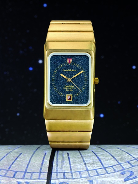 GOLD CONSTELLATION STARDUST Omega, Constellation, Megaquartz, F 2.4 MHz, No. 0340, movement No. 34913551, Ref. BA.396.0806. Sold on 14th Jully, 1975..Very fine and rare, large, rectangular and curved, dead center-seconds, water-resistant, 18K yellow.gold 