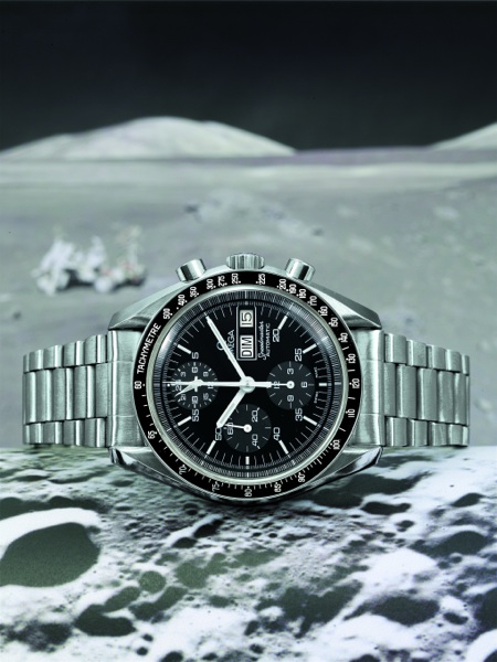 SPEEDMASTER DAY DATE Omega, Speedmaster, Automatic, No. 48233834, Ref. ST 376.0822. Sold on 9th.February, 1988..Very fine, asymmetric, self-winding, water-resistant, stainless steel gentleman's.wristwatch with round button chronograph, registers, central 