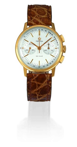 DE VILLE CHRONO Omega, De Ville, No. 25444441, Ref. BA 141.009-67. Sold on May 5, 1968..Fine and rare, water-resistant, 18K yellow gold gentleman`s wristwatch with square button.chronograph, 30-minute register, tachometer and an Omega buckle. This watch i