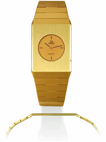 DINOSAURE Omega, Quartz, No. 44632413, Ref. BA 391.9212. Sold on July 1, 1981..Fine and very rare, ultra flat, rectangular, 18K yellow gold gentleman`s quartz wristwatch.with an integrated 18K gold Omega bracelet with concealed deployant clasp..This watch