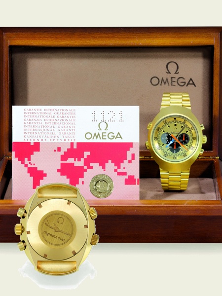 GOLD FLIGHTMASTER Omega, flightmaster, No. 31631464, Ref. BA 345.0801. Sold on April 21, 1971..Very fine and exceptionally rare, two time-zone, water-resistant, 18K yellow gold.aviator`s wristwatch with 4 hands and 3 crowns, round button chronograph, 12-h