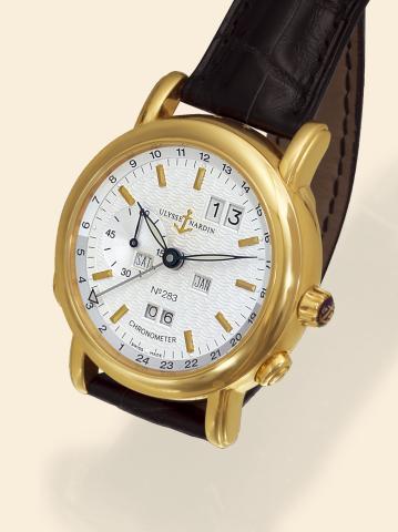 Yellow Gold GMT Perpetual.Ulysse Nardin, Le Locle, Suisse, Chronometer.No. 283, Ref. 322-88. Produced in.a limited edition of 500 examples. Production of this reference.started in 2000..Very fine and rare, self-winding, water-resistant, 18K yellow.gold ge