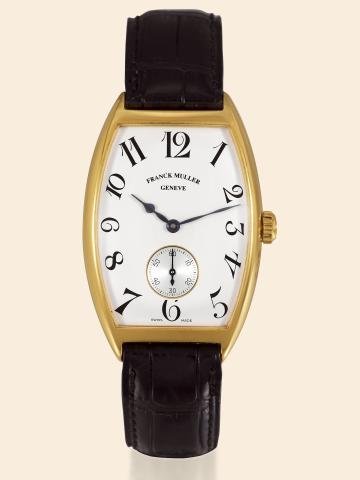 Cintr_e Curvex.Franck Muller, Geneve, Cintr_e Curvex.No. 102, Ref. 2850 S6. Made in the 1990s..Fine, tonneau-shaped and curved, self-winding, 18K yellow.gold gentleman's wristwatch with a yellow gold buckle.