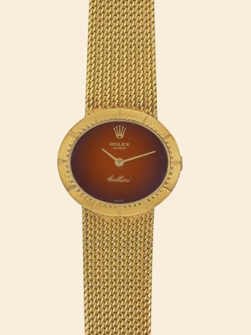 Cellini.Rolex, Cellini, Ref..4081. Made in the 1970s..Fine, horizontal oval, 18K yellow gold.lady's wristwatch with an integral.woven 18K yellow gold Rolex bracelet..To be sold without reserve