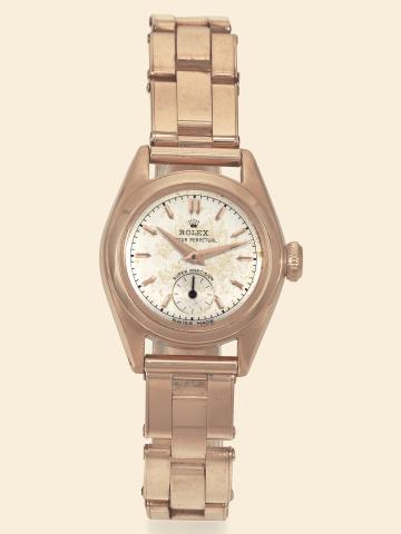 Super Precision.Rolex, Oyster Perpetual Super Precision.Ref. 5002. Made in the early 1950s..Fine, self-winding, water-resistant, 18K pink gold lady's.wristwatch with an 18K pink gold Rolex Oyster expansion.bracelet.