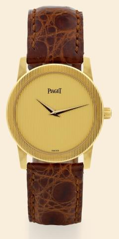 Yellow Gold.Piaget, Ref. 9894. Made in the 1990s..Very fine, 18K yellow gold mid-sized wristwatch with an 18K yellow gold Piaget buckle. Accompanied by a.fitted box and certificate..To be sold without reserve
