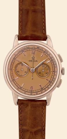 Pink Chronograph.Omega, Swiss.No. 12977206, case.No. 11096386, Ref. 2465. Made in the.1950s..Very fine, 18K pink gold wristwatch with.square button chronograph, register, tachometer.and an Omega pink gold-plated buckle.