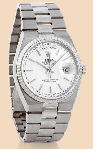 Oyster Quartz - Day-Date.Rolex, Oyster Quartz Day-Date, Superlative.Chronometer Officially Certified, Ref. 19019..Made in 1978..Fine, center seconds, water-resistant, 18K white gold quartz.wristwatch with day and date and an integrated, 18K white.gold lin