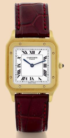 Santos Dumont.Cartier Paris, Collection Priv_e - Santos -.Mecanique, Ref. 1576. Made in the.1990s..Fine and elegant, thin and square, mid-sized, 18K yellow.gold wristwatch with 18K yellow gold Cartier deployant.clasp. Accompanied by a fitted box and certi