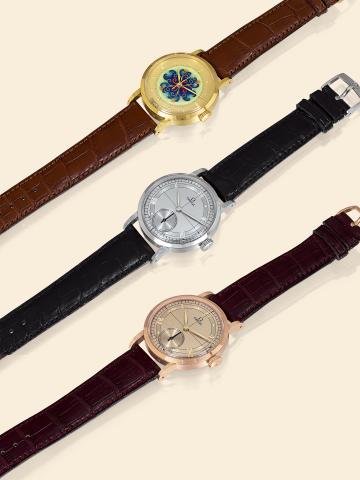 Hundredth Anniversary Limited Edition, Set No. 43.Omega, 1894, Set No. 43 of 100 sets, made in 1994 to mark the hundredth anniversary of Omega..The set comprises two watches with perpendicular line dials and one with cloisonn_ flower dial. Accompanied.by 
