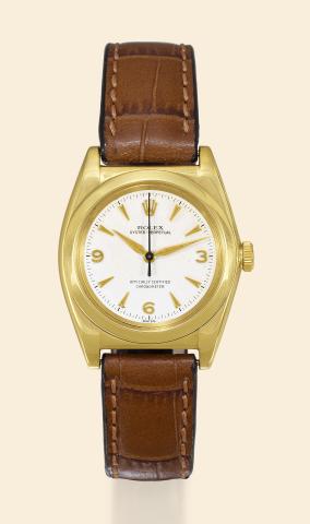 Rolex, Oyster Perpetual, Officially Certified.Chronometer, movement No. 67421.Ref. 3696. Made in the 1940s..Fine and unusual, tonneau-shaped, center seconds, selfwinding.yellow gold and stainless steel wristwatch.