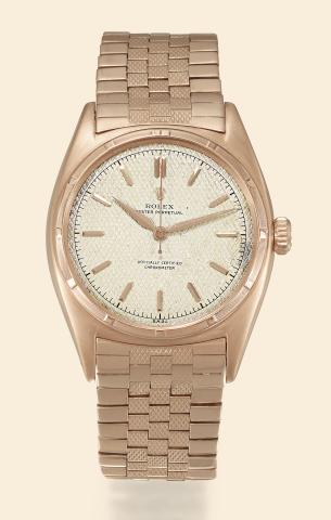 Ref. 6029 Honeycomb Dial.Rolex Oyster Perpetual, Officially Certified.Chronometer, Ref. 6029, case No..706020. Made in 1950..Very rare and fine, tonneau-shaped, center-seconds, selfwinding.water-resistant, 18K pink gold chronometer wristwatch.with silvere