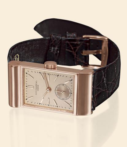 Ref. 599, Pink Gold Asymmetric.Patek Philippe Co., Geneve, No. 833199, case No. 618590, Ref. 599. Made in 1939.sold on May 25th, 1939..Very fine and extremely rare, asymmetric, rectangular, 18K pink gold wristwatch with an 18K pink gold.Patek Philippe b