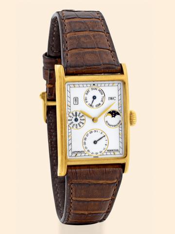 Novecento.International Watch Co., Schaffhausen, Novecento.- Automatic Perpetual, Ref. 3546. Made.in the 1990s..Fine, rectangular, astronomic, self-winding, water-resistant.18K yellow gold wristwatch with perpetual calendar, moon.phases and an 18K yellow 